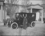 George Eastman (American, 1854–1932), Harvey W. Padelford, George Eastman's Chauffeur and automobile in front of Carriage House, 1923–1932. Gelatin silver print. George Eastman Museum, gift of George B. Dryden.