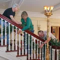 Volunteers from the Council decorating the historic mansion for the holidays in 2024