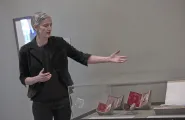 Heather Shannon giving a tour of an exhibition
