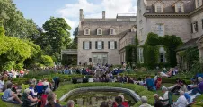 View of the mansion from the Townson Terrace garden during a garden concert