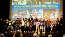 Filmmakers standing on stage at the Dryden Theatre during the 90-Second Newbery Film Festival