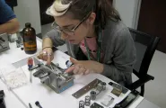 Students inspecting a film