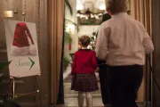 Photograph of Santa and child