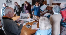 Members on a tour of the upstairs of the mansion