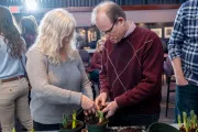 Two attendees of the Blooms & Brews event