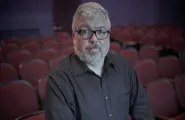 Curator Jared Case in the Dryden Theatre