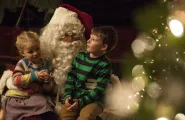 Photograph of Santa and child