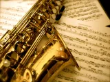 saxophone over sheet music